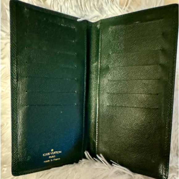 Louis Vuitton Handbags - Authentic LV long bifold Tiaga leather wallet dark green. Practically new
